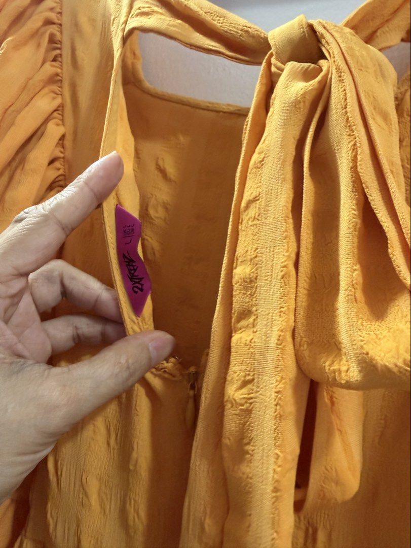 Dress with tie at the back (Category: Dresses) located in Makati City. Submitted by lheigg (Listing ID 1465379632, Image 3). Description: Used twice only Large size.