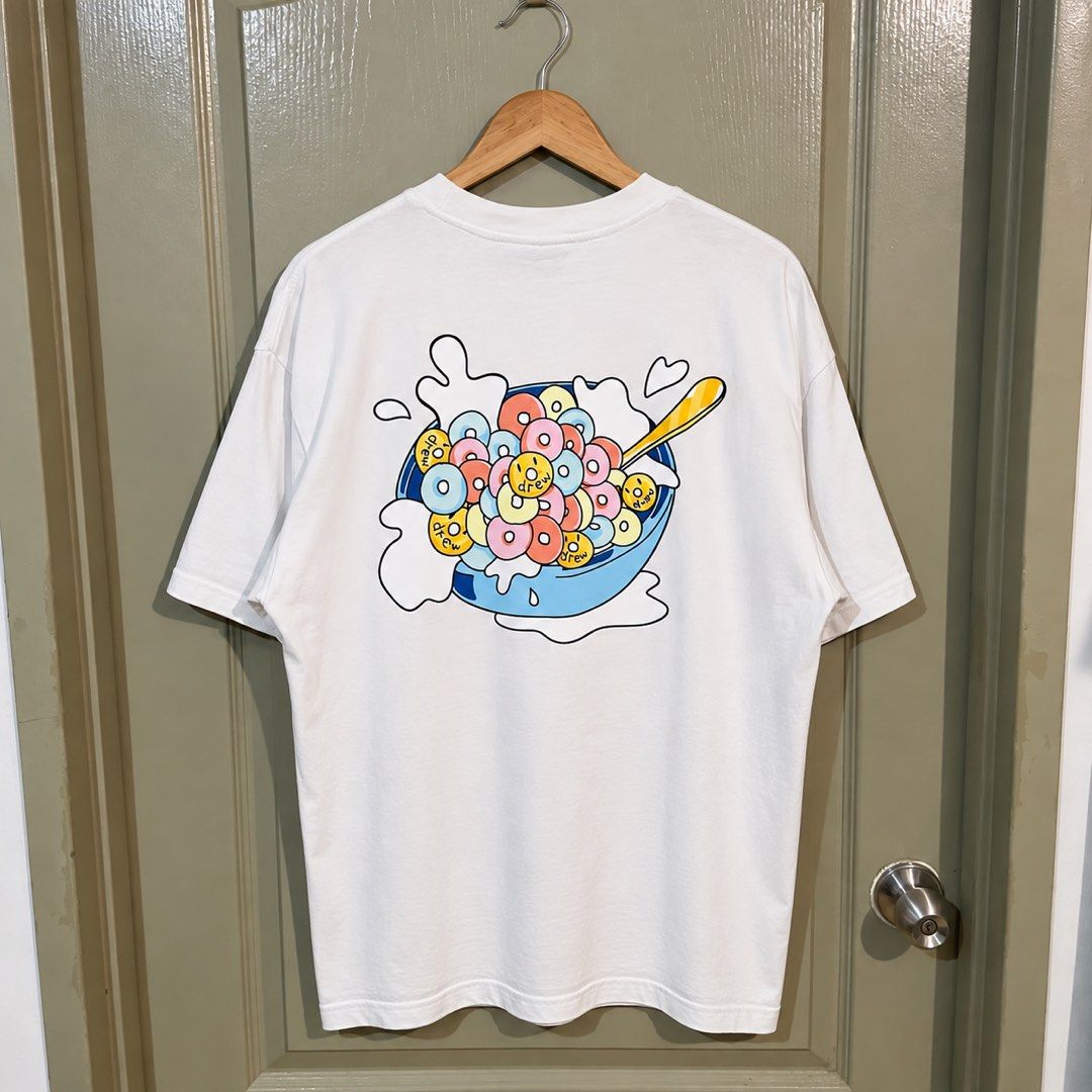 Drew “Cereal” Tee (Category: Tshirts & Polo Shirts ) located in Makati City. Submitted by gustavoo28 (Listing ID 1465355900, Image 2). Description: Authentic/Legit No issues 10/10 color rate Excellent Condition 23W 29L in inches Check photos for reference.