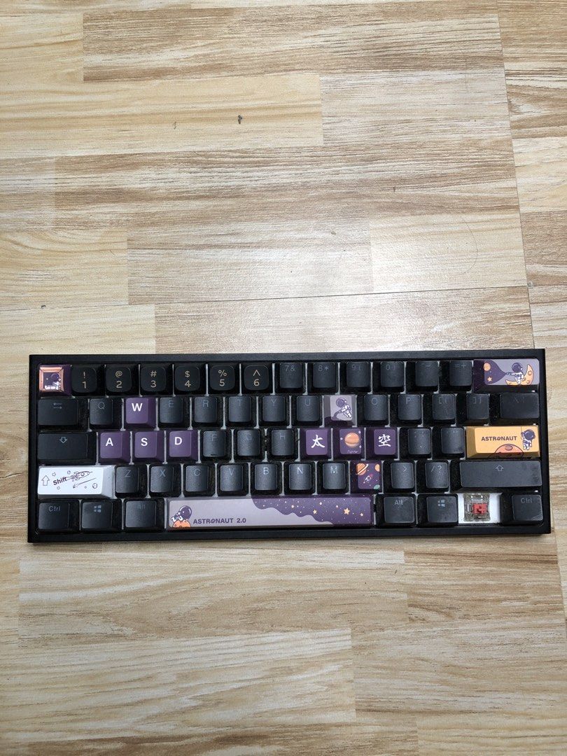 Ducky One 2 Mini - V1 (Category: Computer Keyboard) located in Manila. Submitted by jshmnl (Listing ID 1465359833, Image 1). Description: —60% — Not wireless/Cable not included — Switches: Cherry MX switches - Keycaps: Astronaut 2.0 custom keycaps with purple and black accents, plus novelty caps and special spacebar - Condition: Fully functional with visible dust buildup between keys from storage/use, ready for a quick clean - Honest issue — Lost