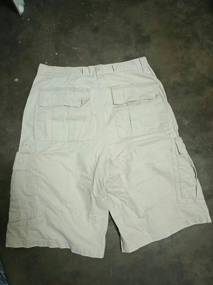 Ecko Unltd Cargo Shorts Beige Size 34 (Category: Shorts) located in Rizal. Submitted by skilidilidu (Listing ID 1465286534, Image 2). Description: - Brand: Ecko Unltd - Style: Heavy utility cargo shorts - Color: Classic beige - Material: Durable, high-quality cotton - Features: Multiple functional pockets, button fly closure - Branding: Red tag on side pocket with embroidered rhino logo - Vibe: Perfect streetwear piece.