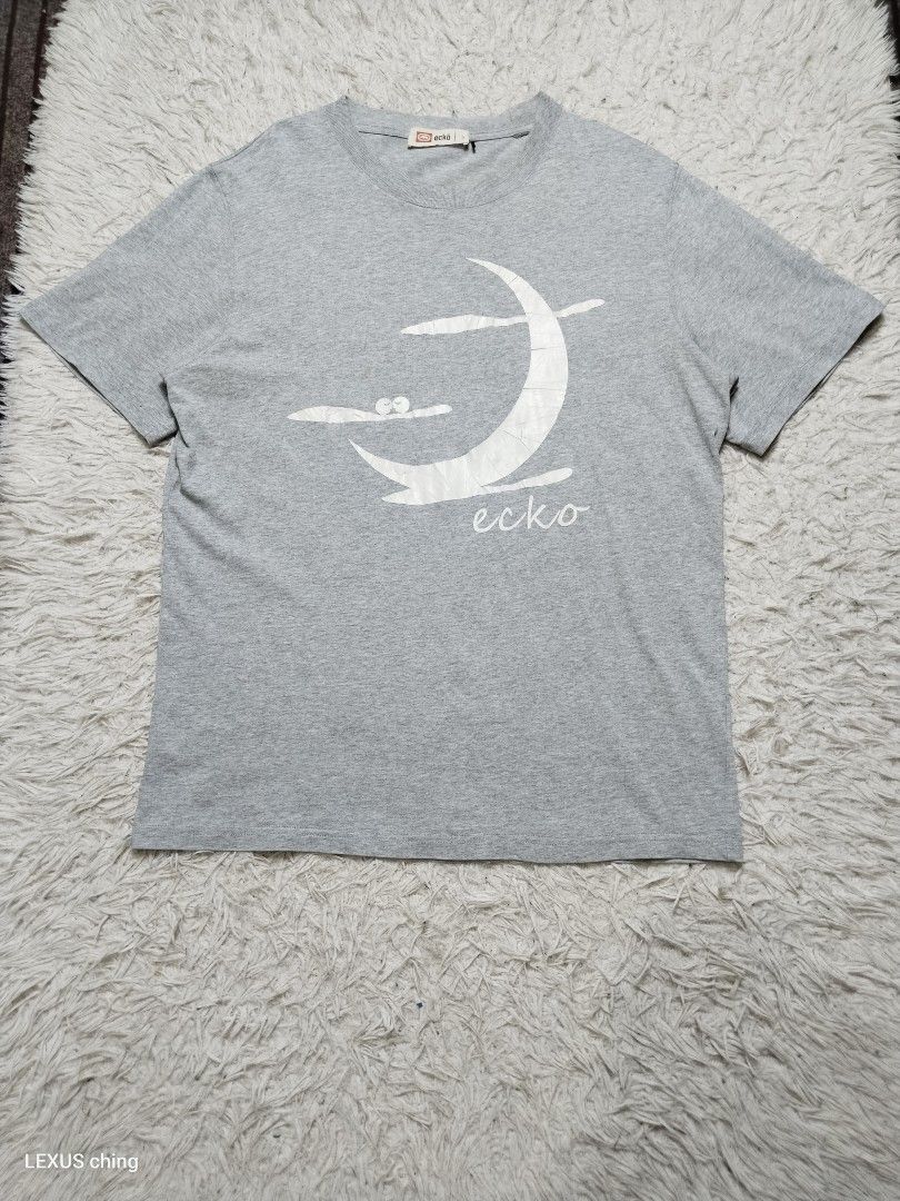 Ecko Unltd mens a white crescent moon abstract cloud print. (Category: Tshirts & Polo Shirts ) located in Manila. Submitted by lexusthrift1995 (Listing ID 1465211725, Image 1). Description: Size- 3 on tag but fit to LARGE Dimension- 21x27.5 Color rate- 9/10 Condition- 9/10 issue- crack print but need wash good condition ‼️200.pesos plus shipping fee 💸MODE OF PAYMENT- GCASH payment first 🚛MODE OF DELIVERY- J&T or LALAMOVE 📍LOCATION- NORTH CALOO