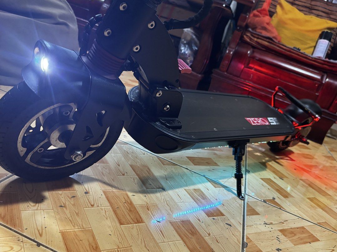 Electric scooter Zero 9 (Category: Bicycles) located in Quezon City. Submitted by dennis1772 (Listing ID 1465337853, Image 1). Description: Motor : 600W rear hub motor (Peak power reaches 1200W Battery: 48V 13Ah LG or Sinc (624Wh) Top speed : Up to 40-45 km/h (depending on rider weight and regional limits) Maximum range: Up to 45 km per charge Weight ~18 kg Max payload: 100 kg to 120 kg (varies by distributor) Wheels /Tire : 8.5-inch pneumatic fr