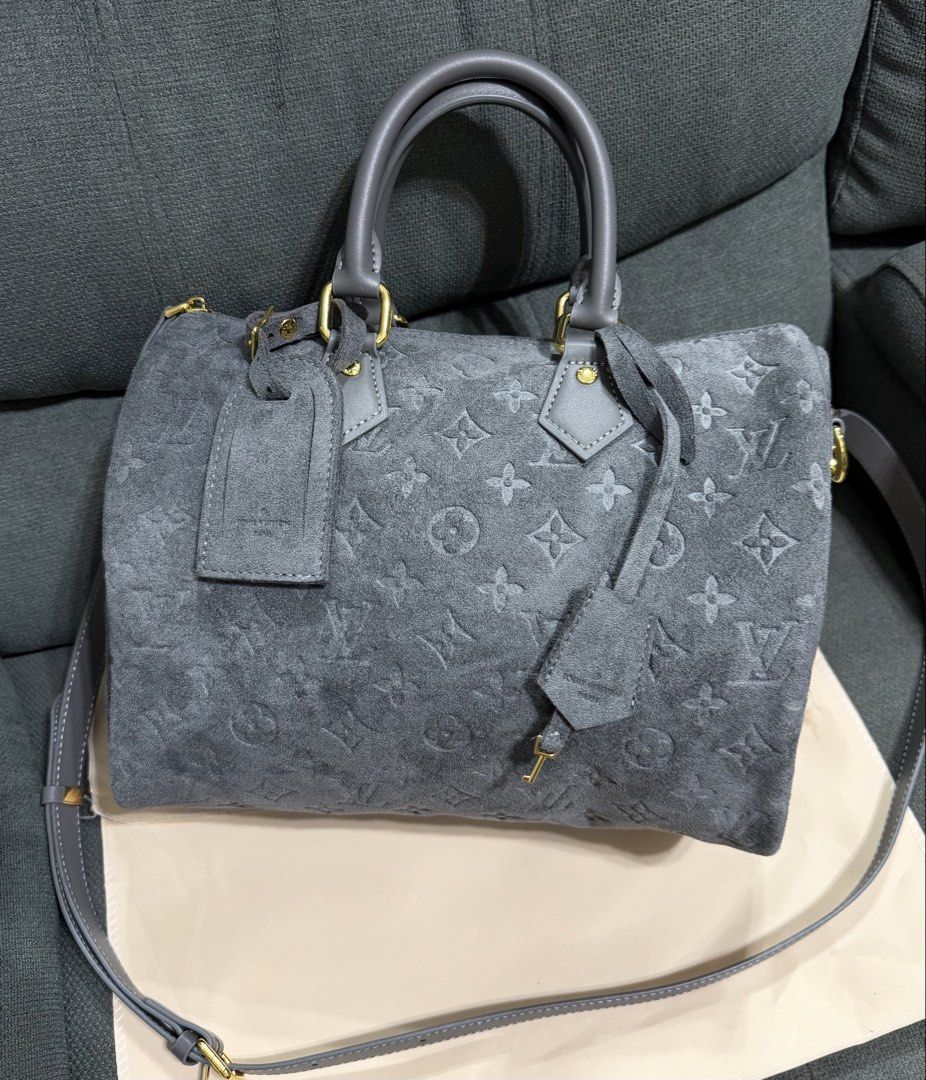 Embossed Speedy Suede Bandouliere (Category: Shoulder Bags) located in Quezon City. Submitted by chic.bags (Listing ID 1465307884, Image 2). Description: Coded With lock and key With hang tag With sling With wallet With dust bag Good as new No issue Actual photo posted Japan preloved Mop: gcash.