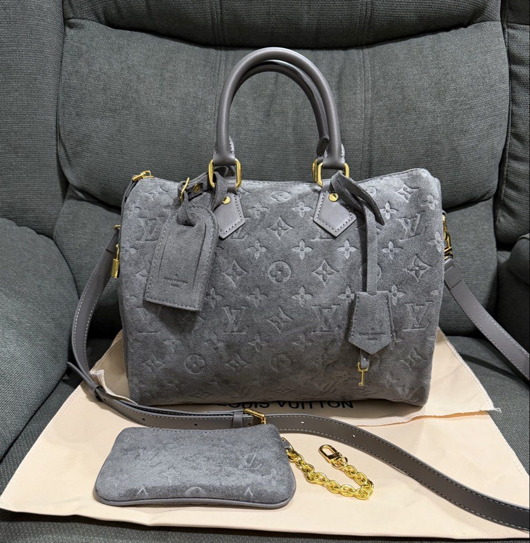 Embossed Speedy Suede Bandouliere (Category: Shoulder Bags) located in Quezon City. Submitted by chic.bags (Listing ID 1465307884, Image 1). Description: Coded With lock and key With hang tag With sling With wallet With dust bag Good as new No issue Actual photo posted Japan preloved Mop: gcash.