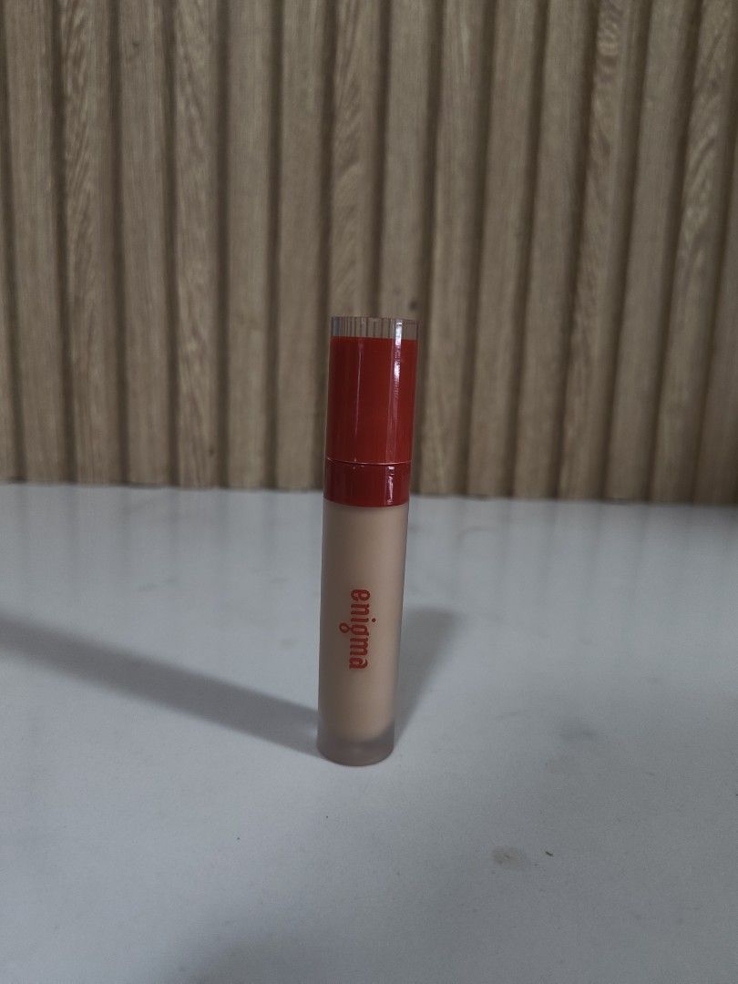 Enigma Concealer in Natural (Category: Makeup) located in Quezon City. Submitted by shengchel (Listing ID 1465193957, Image 1). Description: - Brand/Product: Enigma liquid concealer - Shade: Natural - Condition: Swatched once or twice, practically full - Bought: September 29, 2026 - RFS: Too dark.