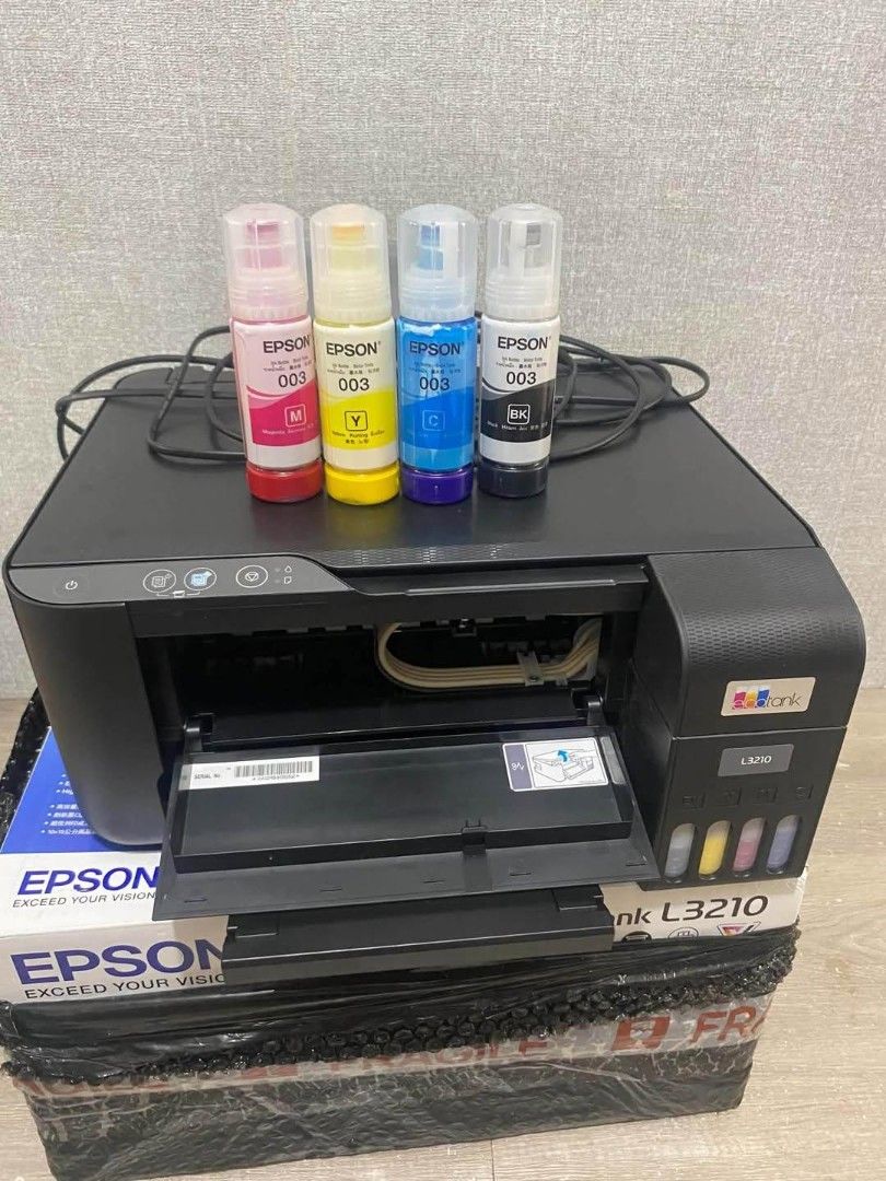 Epson L3210 (Category: Printers, Scanners & Copiers) located in Las Pinas. Submitted by alibaeeee (Listing ID 1465179989, Image 1). Description: no issue, free na yung ink. pick up or meet up las piñas or nearby areas.
