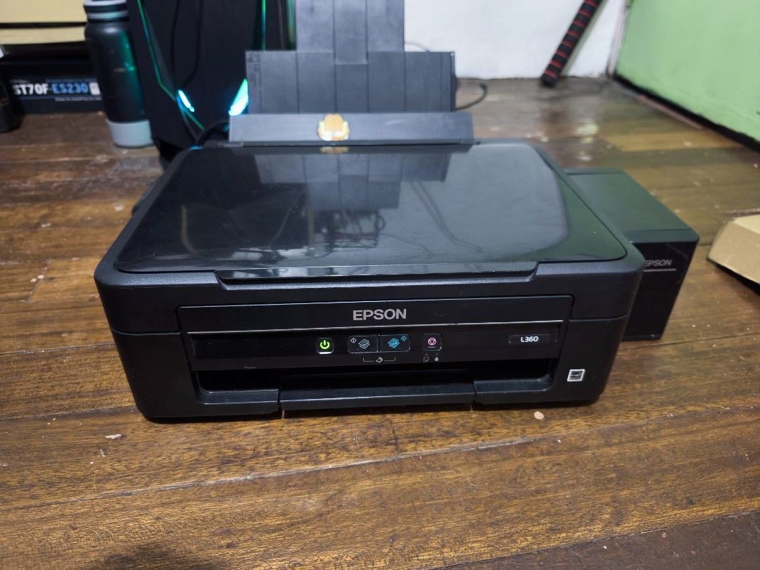 Epson L360 (Category: Printers, Scanners & Copiers) located in Quezon City. Submitted by dennisalca52135 (Listing ID 1465381158, Image 1). Description: EPSON L360 -PRINTER ONLY (Scanner is defective - Paayos nyo nalang) ISSUE: Power button must press and hold. (Pm for video) Negotiable Good for student and thesis! RFS: Di na nagagamit. Malabon.