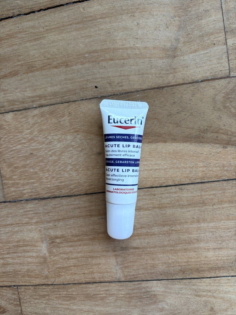 Eucerin Acute Lip Balm 10ml (Category: Face Care) located in Makati City. Submitted by skinsourcemnl (Listing ID 1465199506, Image 2). Description: - Product: Eucerin Acute Lip Balm - Size: 10ml tube - Condition: Brand new, unopened, sealed, with box - Expiry Date: 05/2029 (printed on crimped end) - Benefits: Instantly helps extremely dry and chapped lips with soothing Licochalcone A - Perfect to keep in your bag for everyday protection against d