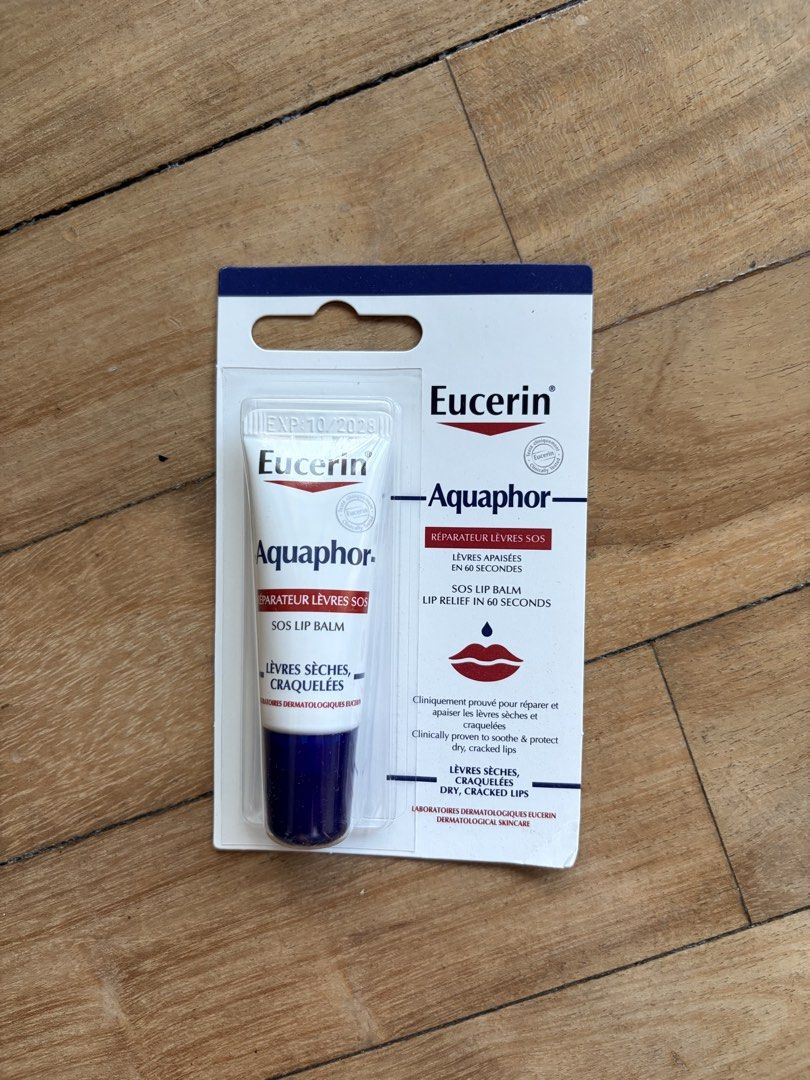 Eucerin Aquaphor SOS Lip Balm (Category: Face Care) located in Makati City. Submitted by skinsourcemnl (Listing ID 1465199593, Image 1). Description: - Product: Eucerin Aquaphor SOS Lip Balm (Original Packaging) - Condition: Brand new, factory-sealed in blister pack, never used - Benefits: Fast-acting relief for dry and cracked lips within 60 seconds - Expiry Date: October 2023 - Perfect size to keep in your bag for traveling or dry air.