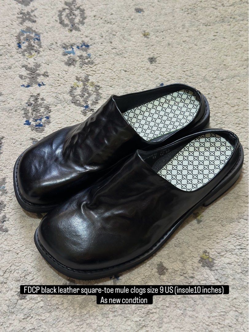 FDCP Black Leather Square-Toe Mule Clogs Size 9 US (Category: Flats & Sandals) located in Daet. Submitted by thrifthings2018 (Listing ID 1465217688, Image 1). Description: - Style: Slip-on black leather mules with a trendy square toe - Size: US 9 (marked 255) - Measurements: 10-inch insole - Details: Features stylish patterned insoles - Condition: Clean, worn briefly only for photos.