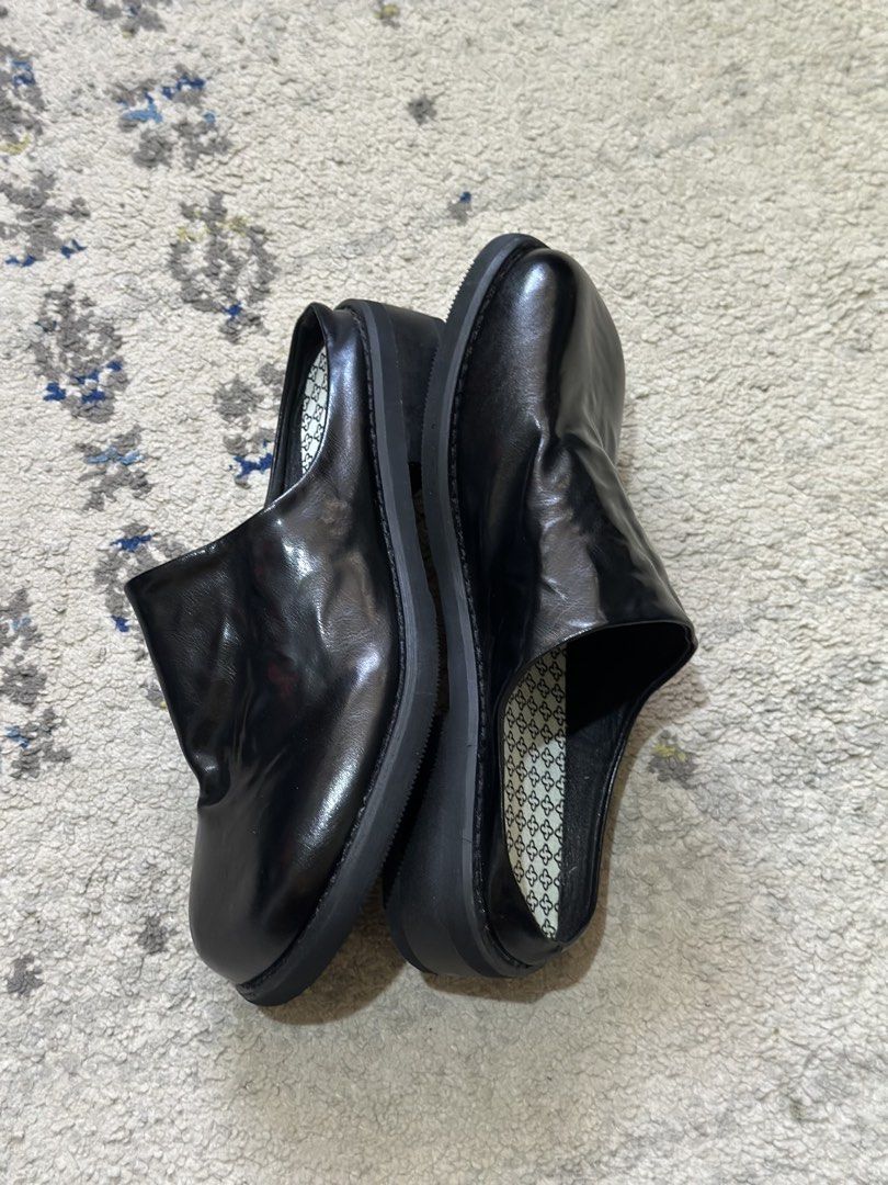 FDCP Black Leather Square-Toe Mule Clogs Size 9 US (Category: Flats & Sandals) located in Daet. Submitted by thrifthings2018 (Listing ID 1465217688, Image 3). Description: - Style: Slip-on black leather mules with a trendy square toe - Size: US 9 (marked 255) - Measurements: 10-inch insole - Details: Features stylish patterned insoles - Condition: Clean, worn briefly only for photos.