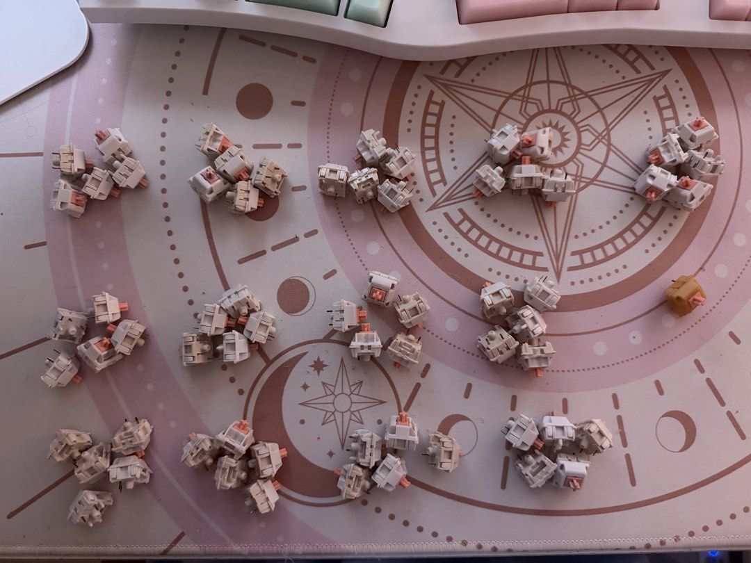 Feker and MMD Holy Pandas (Mixed) (Category: Computer Keyboard) located in Quezon City. Submitted by baileyyy10 (Listing ID 1465340809, Image 2). Description: - Type: Tactile switches - Colorway: White housing with peach stems - Condition: Pulled from a keyboard build, clean pins, works smoothly - Quantity: 65 pcs mixed, with 1 free Gazzew U4T .