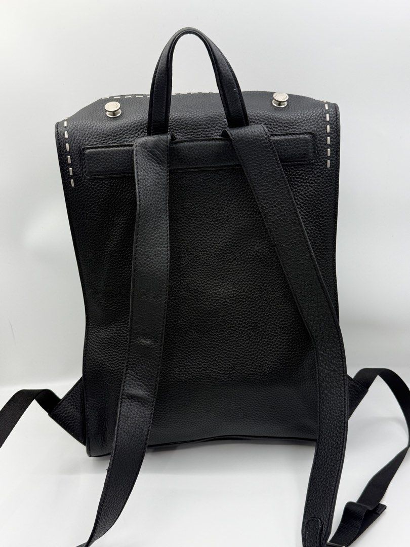 Fendi Black Leather Selleria Backpack (Category: Backpacks) located in Caloocan City. Submitted by rossvault2 (Listing ID 1465241117, Image 3). Description: - Brand: authentic Fendi - Material: Premium black grained leather - Design: Signature Selleria hand-stitched front edges - Closure: Dual zipper with leather pull tabs and engraved Fendi Roma branding - Comfort & Carry: Adjustable shoulder straps and sturdy top handle - Style: Sleek, minimali