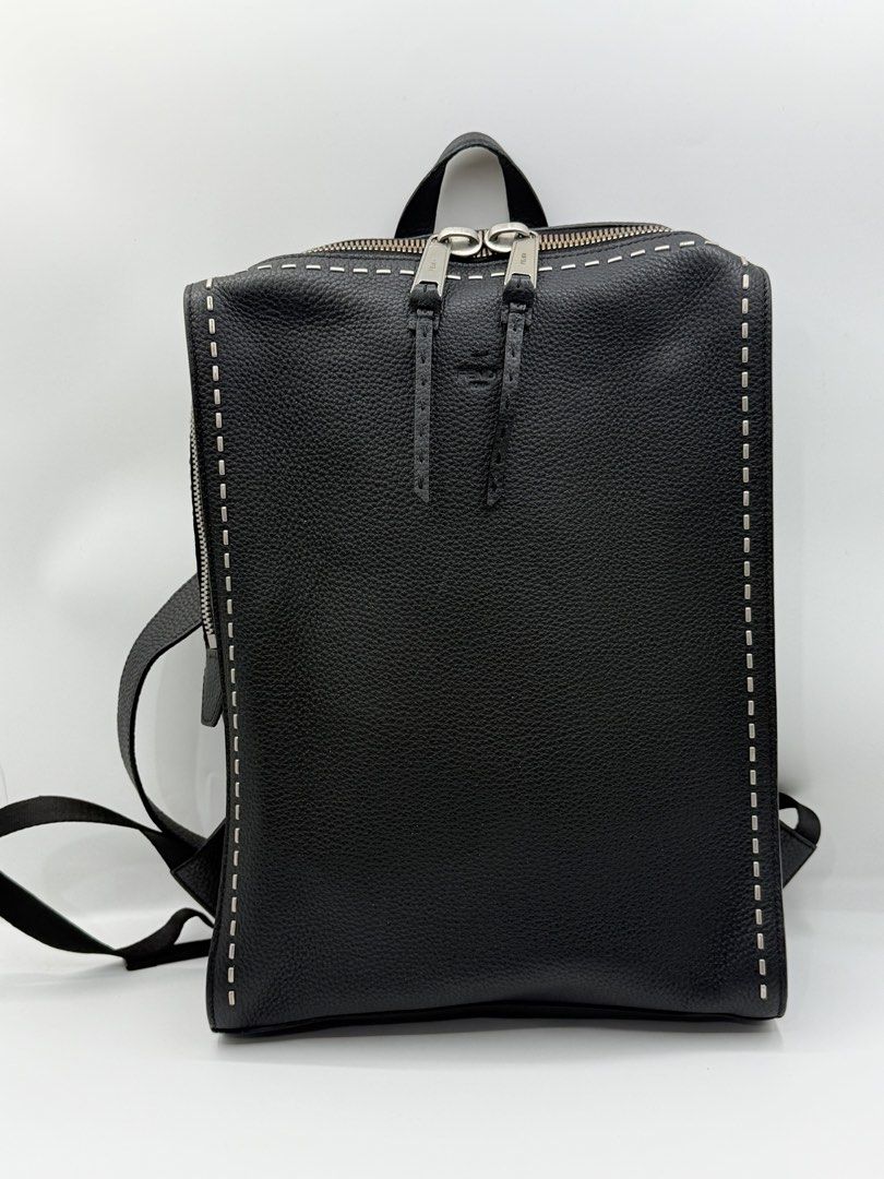 Fendi Black Leather Selleria Backpack (Category: Backpacks) located in Caloocan City. Submitted by rossvault2 (Listing ID 1465241117, Image 1). Description: - Brand: authentic Fendi - Material: Premium black grained leather - Design: Signature Selleria hand-stitched front edges - Closure: Dual zipper with leather pull tabs and engraved Fendi Roma branding - Comfort & Carry: Adjustable shoulder straps and sturdy top handle - Style: Sleek, minimali