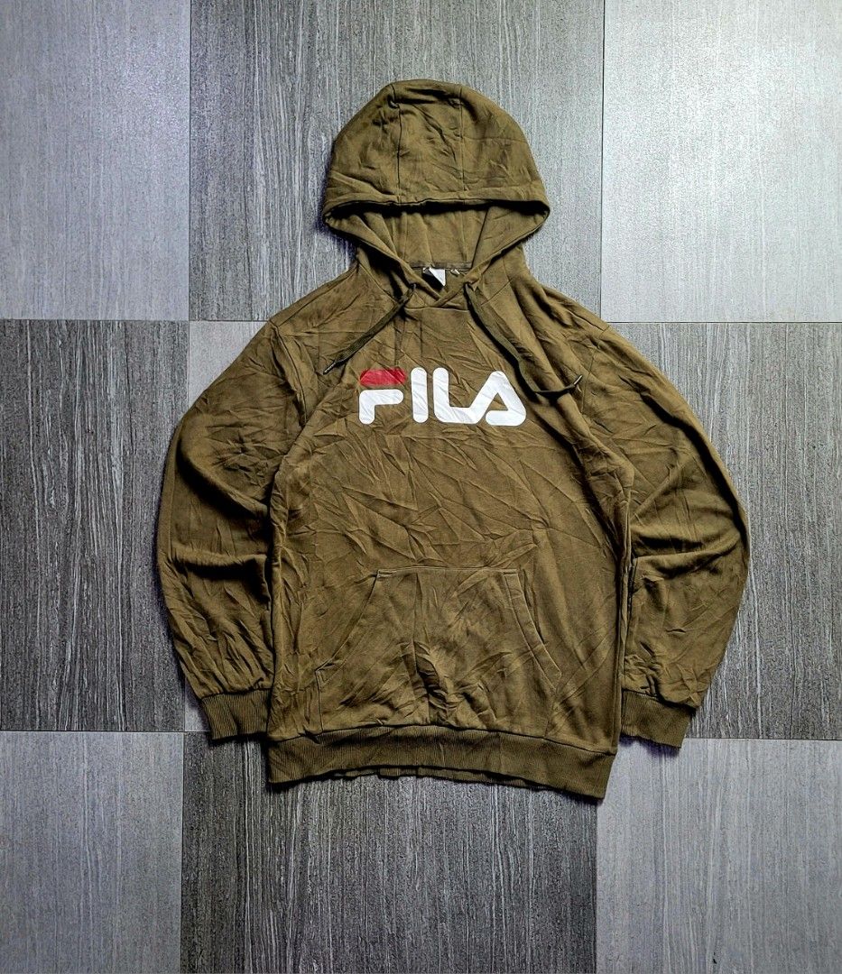FILA LINEAR LOGO PULLOVER HOODIE (Category: Hoodies) located in Manila. Submitted by 7100treasure.co (Listing ID 1465345507, Image 1). Description: FILA LINEAR LOGO PULLOVER HOODIE ​Brand: FILA ​Size: Large (Tag) / Fits Medium to Large ​Dimensions: 22" Width x 28" Length ​📍 Location: Dipolog City, Zamboanga del Norte 🚛 J&T Courier 💸 MOP: GCash / Bank Transfer / MariBank ​📩 PM TO MINE!.