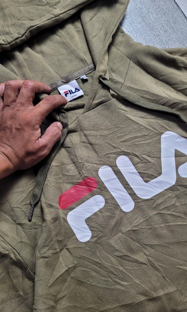 FILA LINEAR LOGO PULLOVER HOODIE (Category: Hoodies) located in Manila. Submitted by 7100treasure.co (Listing ID 1465345507, Image 3). Description: FILA LINEAR LOGO PULLOVER HOODIE ​Brand: FILA ​Size: Large (Tag) / Fits Medium to Large ​Dimensions: 22" Width x 28" Length ​📍 Location: Dipolog City, Zamboanga del Norte 🚛 J&T Courier 💸 MOP: GCash / Bank Transfer / MariBank ​📩 PM TO MINE!.