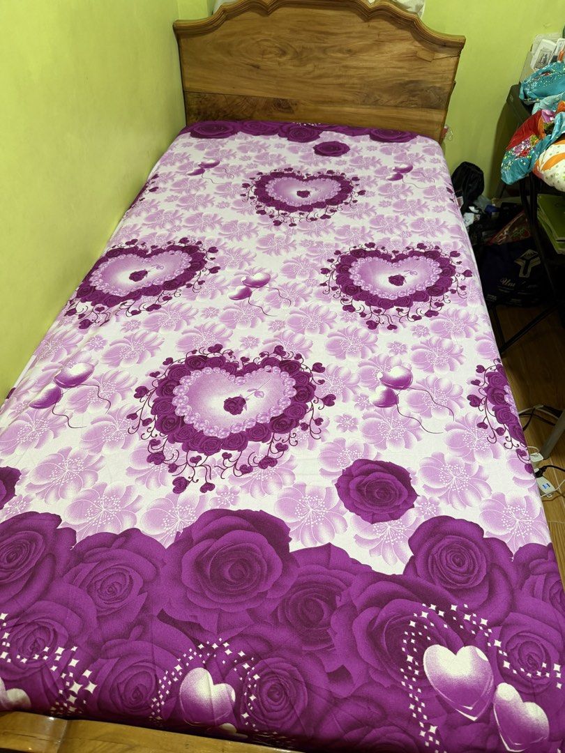 Floral pattern bedsheet set (Category: Bedding & Towels) located in Quezon City. Submitted by beauty_eunice (Listing ID 1465172863, Image 2). Description: 3 pcs bedsheet bundle sale !! preloved almost new fit for single bed 36x75 - Vibrant floral and tropical leaf design with red, orange, and purple flowers on a turquoise background - Fits standard single frames nicely - Made of soft, comfortable fabric - Machine washable and easy to maintain - C