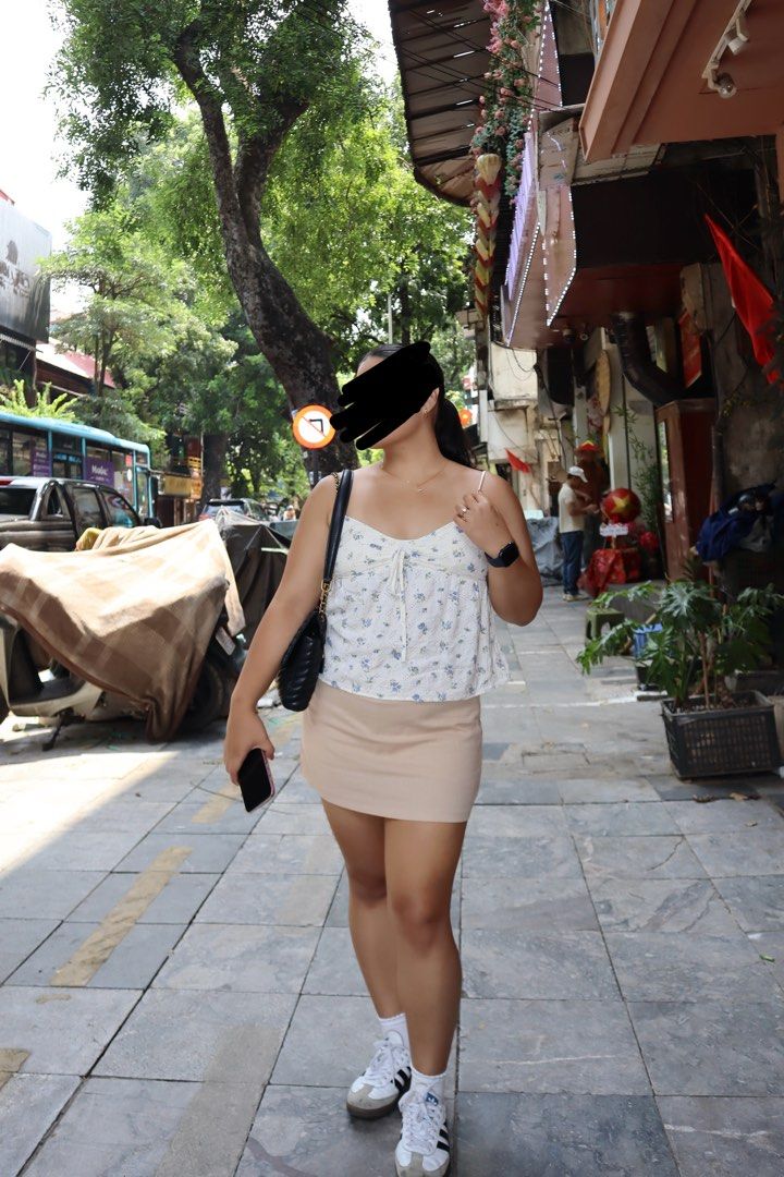 Floral White Baby Top (Category: Others Tops) located in Manila. Submitted by tracyla_ (Listing ID 1465348641, Image 1). Description: - Bought from tiktok shop - Size Large - Adjustable Straps.