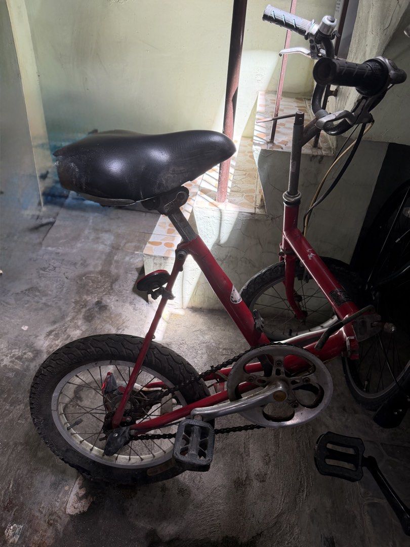 Bridgestone One Touch Picnica Folding Bike (Category: Bicycles) located in Carmona. Submitted by saintkjs (Listing ID 1465213082, Image 1). Description: Bridgestone One Touch Picnica Japanese Folding Bike - Frame: Steel frame with Mini Velo Club Philippines sticker - Wheel size: 16 × 2.10 inches - Tires: Thick tires (still in good condition, just needs air) - Brake: Brake line issue - Rust: Some surface rust on the chain and handlepost due to sto