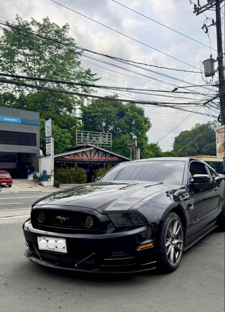 Ford Mustang 5.0 GT Coupe (A) (Category: Used Cars) located in Manila. Submitted by guevarajus72137 (Listing ID 1465206159, Image 2). Description: 2014 Ford Mustang GT V8 S197 (Coyote) 33k original mileage Panoramic roof Front splitter Original paint Borla Exhaust No issues Not flooded.
