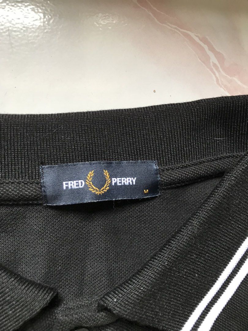 FRED PERRY POLO SHIRT (Category: Activewear) located in Manila. Submitted by crismil1 (Listing ID 1465337312, Image 2). Description: DIMES 27 LENGTH 19 WIDTH NO ISSUE AS NEW CONDITION 11/10 COLOR RATE .