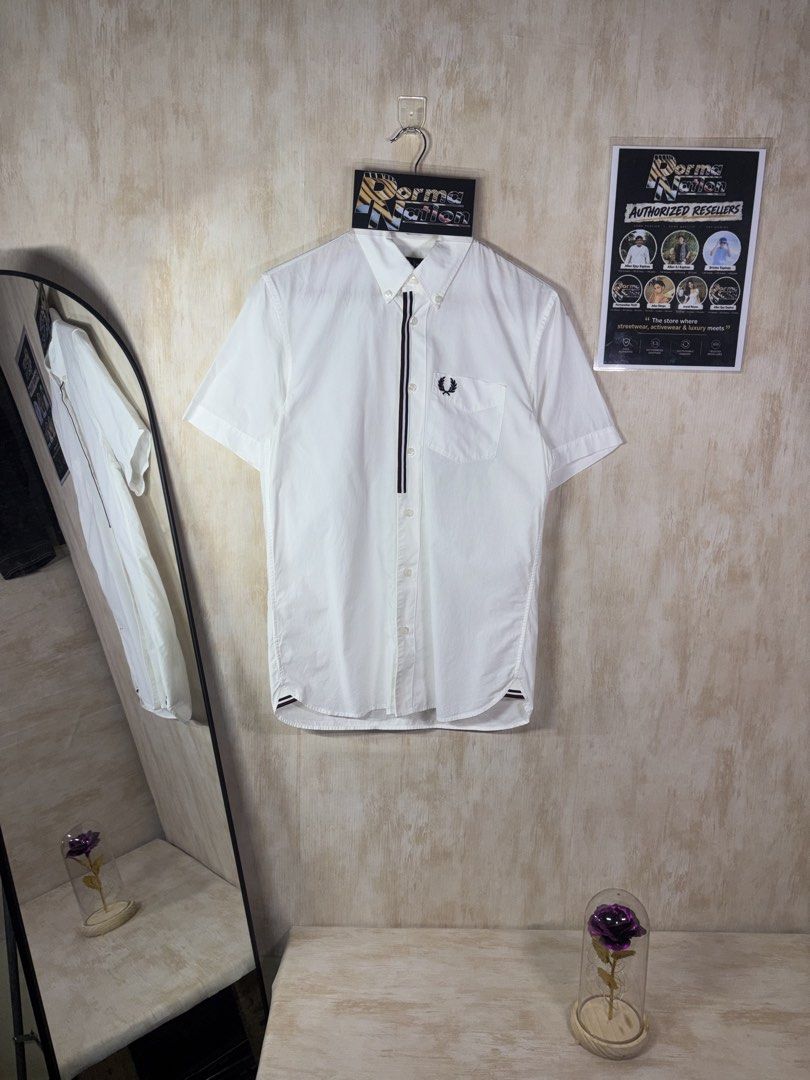 FRED PERRY TAPED PLACKET SHIRT (Category: Tshirts & Polo Shirts ) located in Cabuyao City. Submitted by pormanation-thrift-store (Listing ID 1465192883, Image 1). Description: FRED PERRY TAPED PLACKET SHIRT Condition: LIKE NEW Color rate: 10/10 (PWEDE SA MASELAN) Size: SMALL Dimes: 19”Wx28”L Issue: NONE❌ Price: 2000.