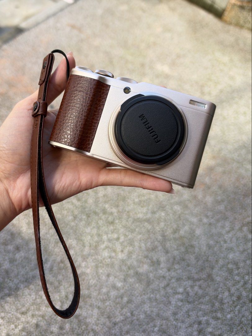 Fujifilm XF10 Compact Digital Camera (No box) (Category: Cameras) located in Cebu City. Submitted by christyyynnn (Listing ID 1465123751, Image 1). Description: - Model: Fujifilm XF10 Compact Digital Camera - Color: Champagne Gold with stylish brown leatherette grip - like new, shutter count less than 300 - Extras: Built-in flash and attached brown strap included - Ideal for: Everyday carry (EDC) and street photography -no box.