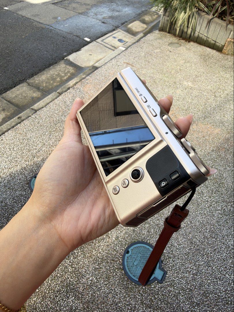 Fujifilm XF10 Compact Digital Camera (No box) (Category: Cameras) located in Cebu City. Submitted by christyyynnn (Listing ID 1465123751, Image 2). Description: - Model: Fujifilm XF10 Compact Digital Camera - Color: Champagne Gold with stylish brown leatherette grip - like new, shutter count less than 300 - Extras: Built-in flash and attached brown strap included - Ideal for: Everyday carry (EDC) and street photography -no box.