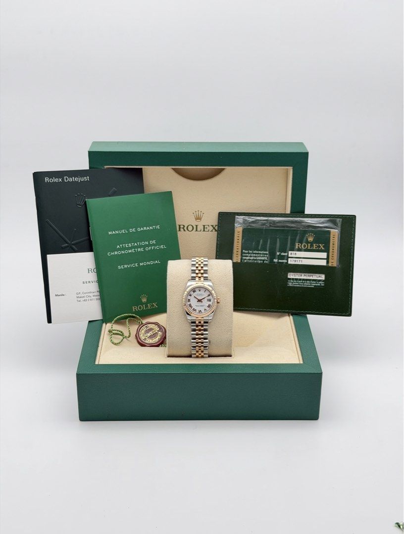 Fullset Rolex Datejust 26mm White Roman Dial (Category: Luxury Watches) located in Manila. Submitted by timelesseleganceph (Listing ID 1465197499, Image 2). Description: Fullset Rolex Datejust 26mm White Roman Dial Reference 179171 Size 26mm Dated Dec 2014 Local AD 18k Rose Gold Fluted Bezel, White Roman Dial in Continuous Super Jubilee Bracelet Complete/Fullset - Box, Warranty Card, Booklets, Tag.