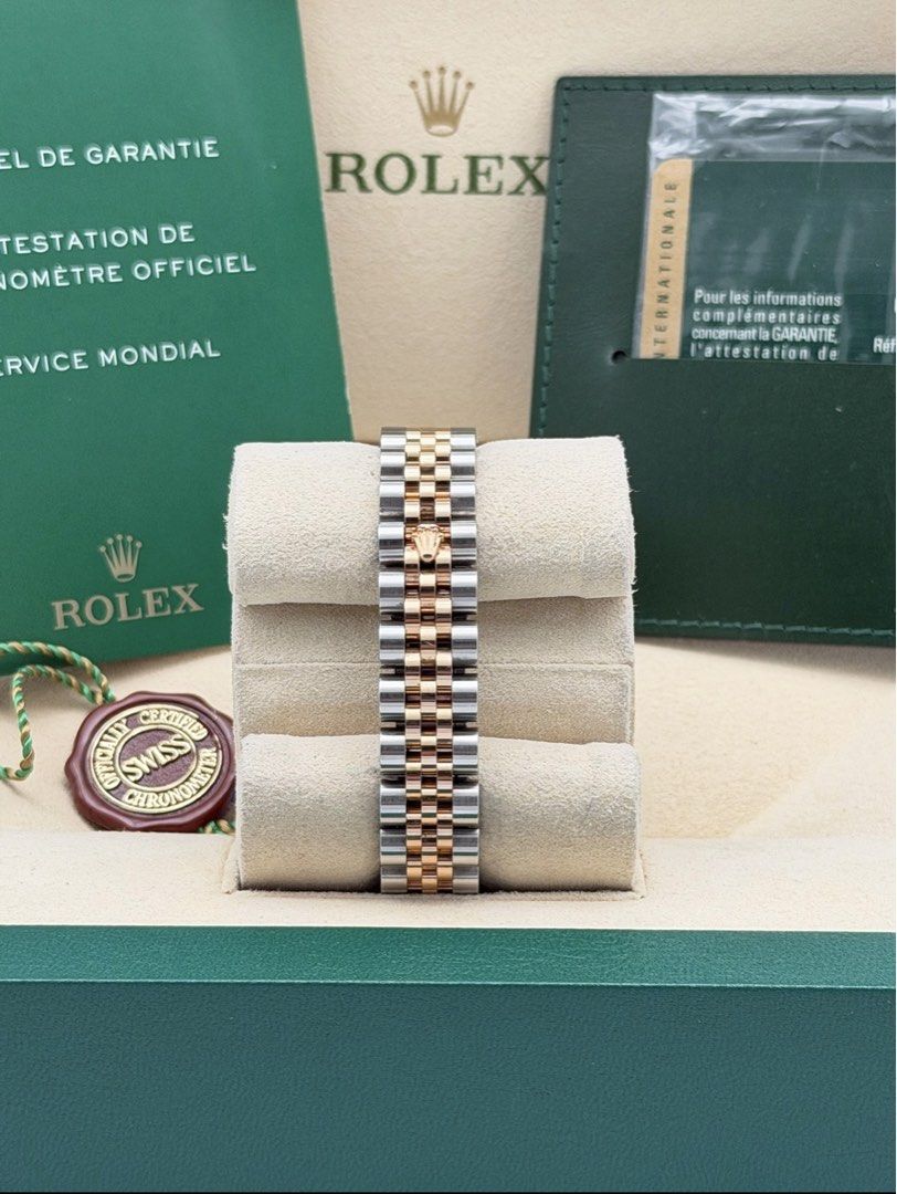 Fullset Rolex Datejust 26mm White Roman Dial (Category: Luxury Watches) located in Manila. Submitted by timelesseleganceph (Listing ID 1465197499, Image 3). Description: Fullset Rolex Datejust 26mm White Roman Dial Reference 179171 Size 26mm Dated Dec 2014 Local AD 18k Rose Gold Fluted Bezel, White Roman Dial in Continuous Super Jubilee Bracelet Complete/Fullset - Box, Warranty Card, Booklets, Tag.