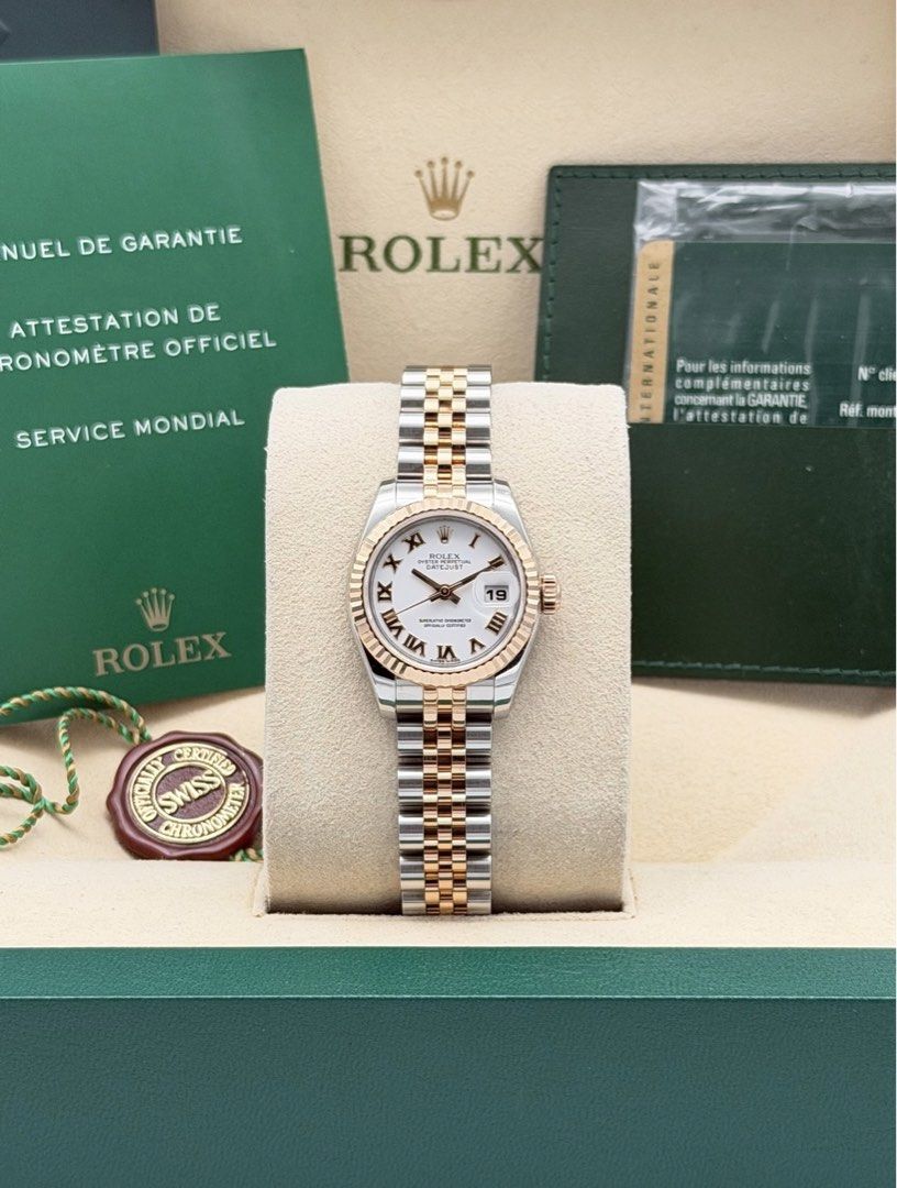 Fullset Rolex Datejust 26mm White Roman Dial (Category: Luxury Watches) located in Manila. Submitted by timelesseleganceph (Listing ID 1465197499, Image 1). Description: Fullset Rolex Datejust 26mm White Roman Dial Reference 179171 Size 26mm Dated Dec 2014 Local AD 18k Rose Gold Fluted Bezel, White Roman Dial in Continuous Super Jubilee Bracelet Complete/Fullset - Box, Warranty Card, Booklets, Tag.