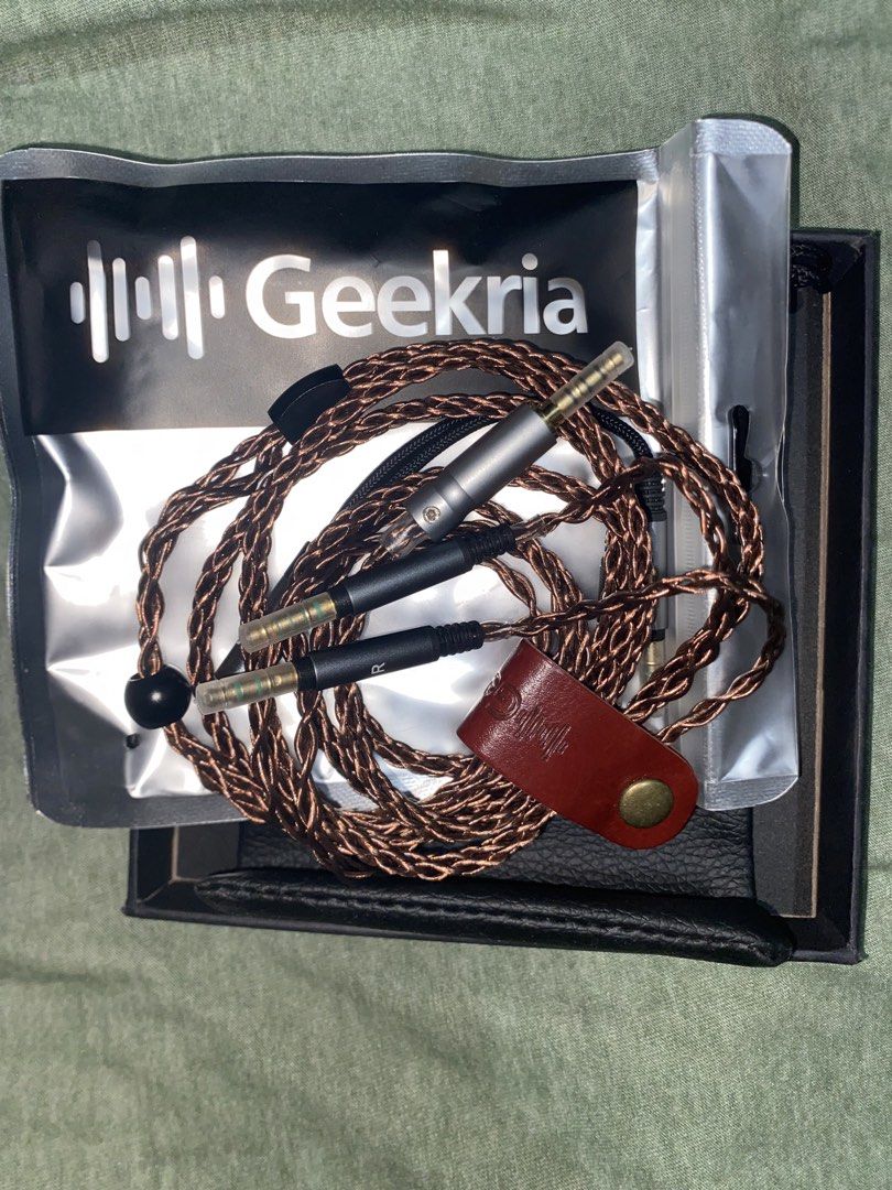 Geekria Apollo Upgrade Copper Audio Cable (Category: Other Audio Equipment) located in Binangonan. Submitted by r0nb1nt5cat5co (Listing ID 1465361386, Image 2). Description: Includes 1.5m Left and Right 4.4mm Jack Mic and Audio Splitter Leather Bag Unused, price can be negotiated..