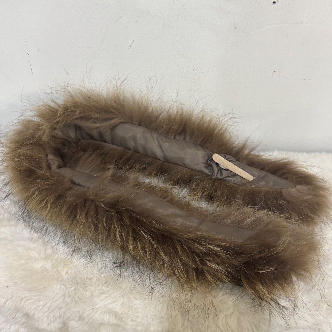 Genuine Brown Fur Scarf Fluffy Winter Collar (Category: Scarves) located in Rizal. Submitted by houseofbell (Listing ID 1465374876, Image 3). Description: - Super soft and warm fluffy brown faux fur - Smooth brown interior lining with a small loop fastener - Perfect for adding extra warmth to winter jackets and sweaters - Clean edges and well-maintained condition.