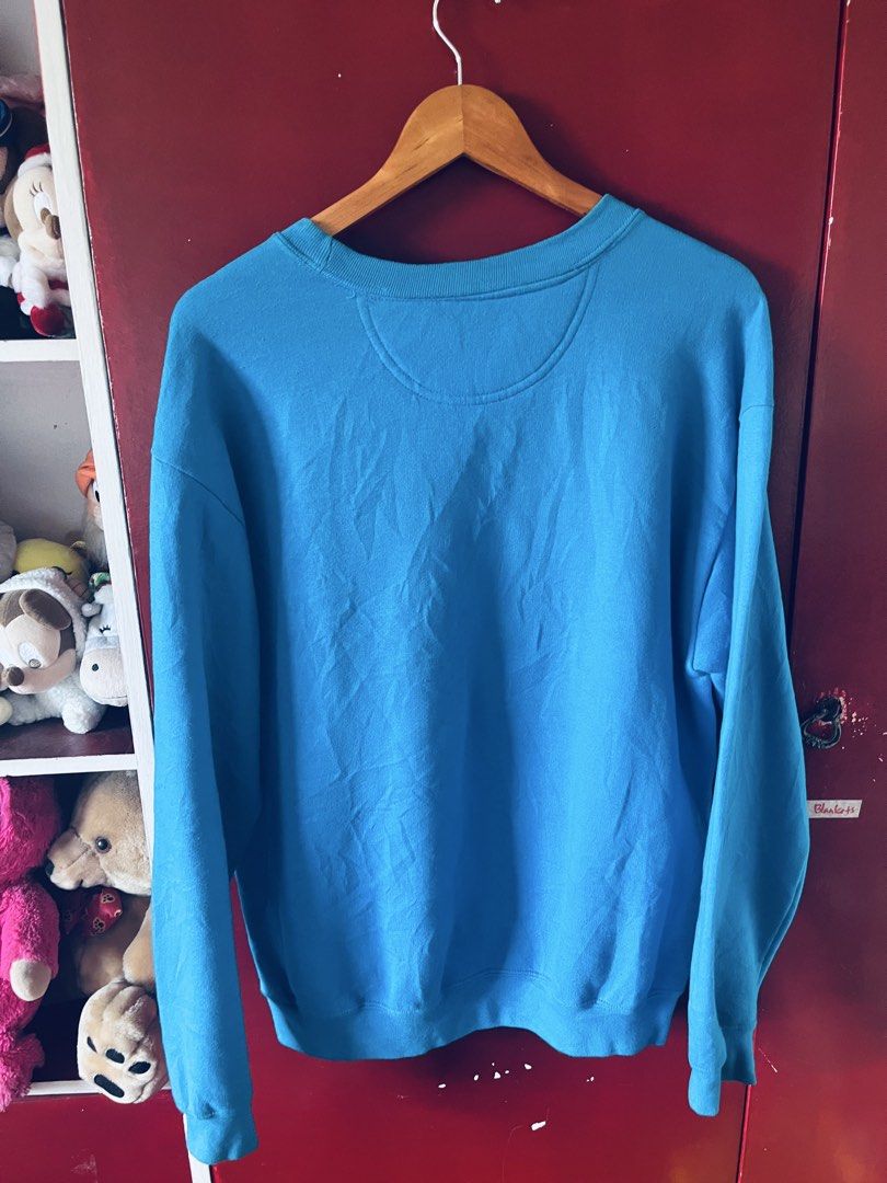 Gildan Sweatshirt (Category: Activewear) located in Quezon City. Submitted by wacpon_061972 (Listing ID 1465205903, Image 3). Description: This is a bright blue crewneck sweattshirt by the brand Gildan. .