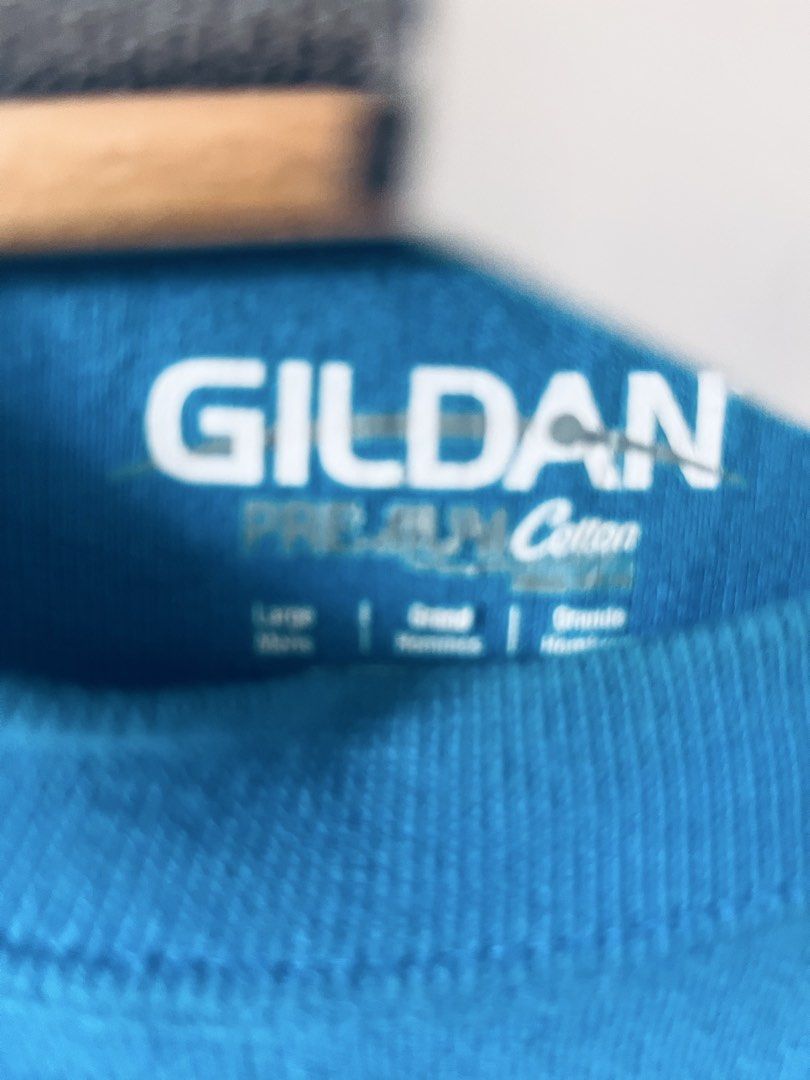 Gildan Sweatshirt (Category: Activewear) located in Quezon City. Submitted by wacpon_061972 (Listing ID 1465205903, Image 2). Description: This is a bright blue crewneck sweattshirt by the brand Gildan. .