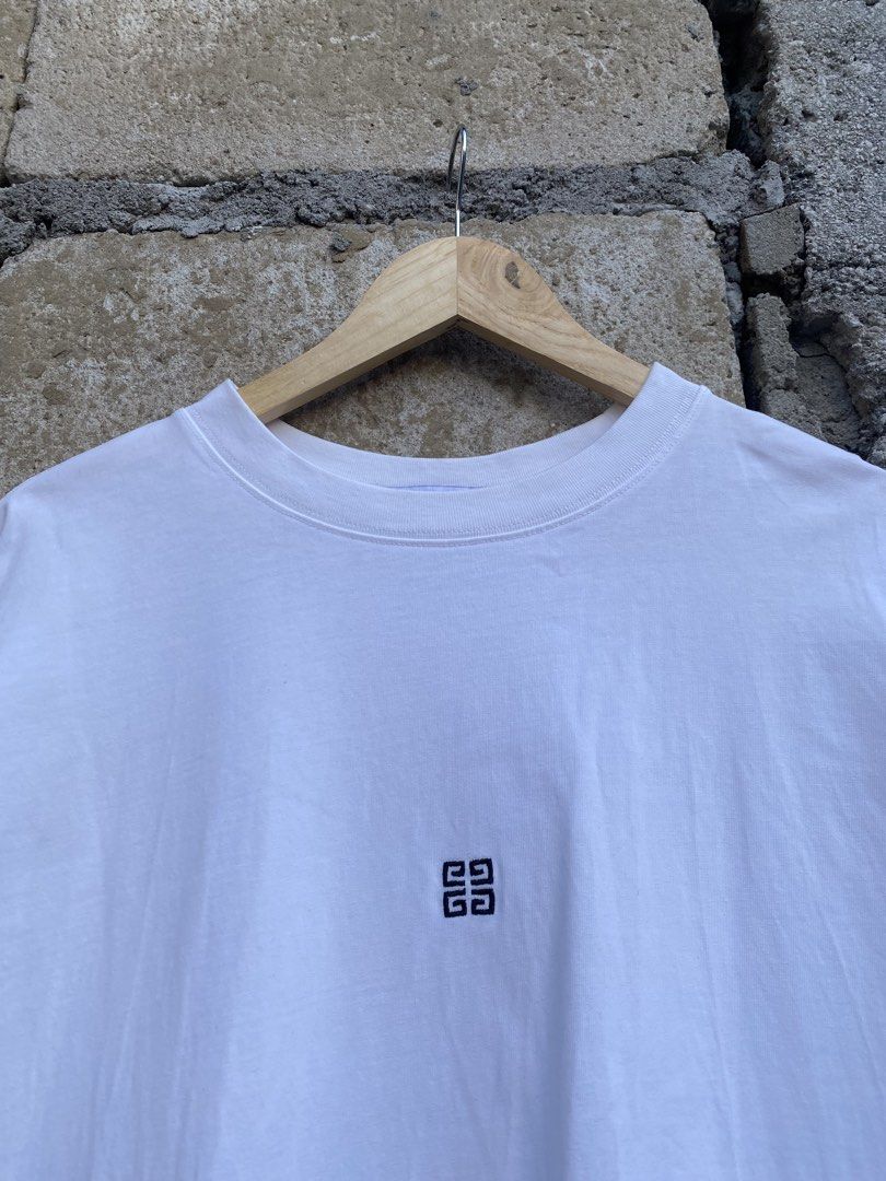 Givenchy 4G Embroid Logo (Category: Formal Shirts) located in Candaba. Submitted by dejesus.bench17 (Listing ID 1465227896, Image 3). Description: Givenchy 4G Embroidered Logo W/Script on Back -Color: White -Condition: Excellent -Color rate: 9/10 -Issue: None -Dimes: W22.5 L29 -Price: 599 + ship.