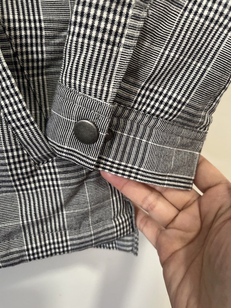 GLOBAL WORK Black White Plaid Jacket Size M (Category: Babies & Kids Fashion) located in Tarlac. Submitted by mydeezoo (Listing ID 1465225647, Image 3). Description: - Brand/Style: Global Work black and white plaid jacket - Size: Medium (tag attached) - Features: Full zip front with collar, quilted black inner lining - Pockets & Cuffs: Two front pockets and button cuffs - Condition: great for cooler weather.