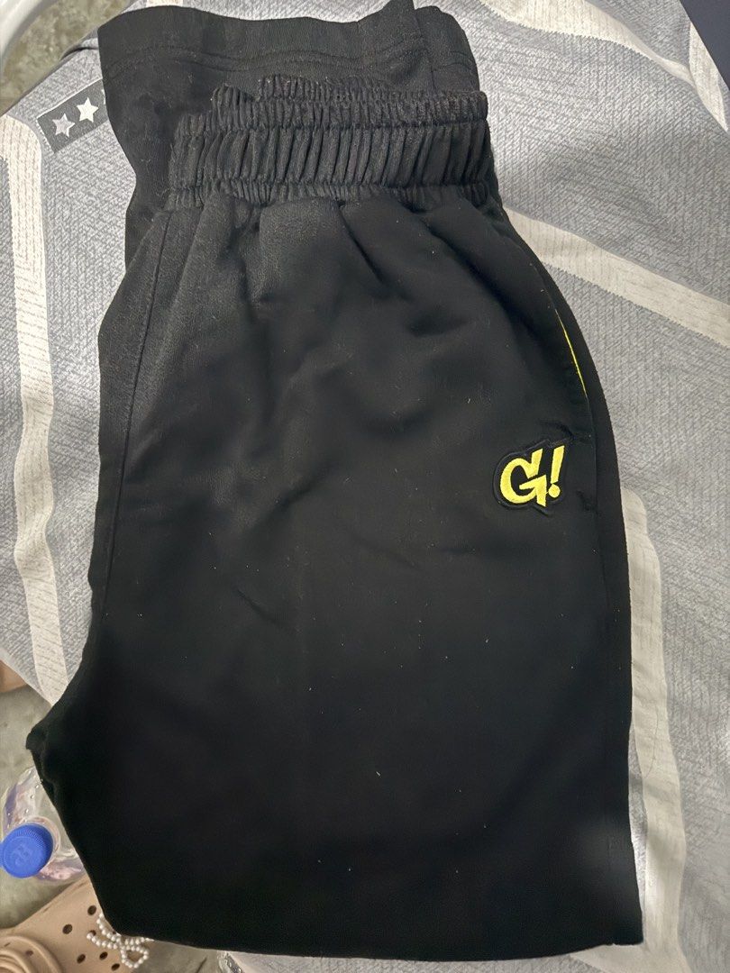 Gnarly sweatpants joggers (Category: Joggers) located in Mandaluyong City. Submitted by whitemoveout (Listing ID 1465326853, Image 1). Description: - Color: Black - Size: Medium - Details: Yellow detailing on pocket lining and logo on left hip - Fit: Elastic waistband and stretchy material for maximum comfort - Ideal for: Daily wear or lounging at home - Condition: Recently purchased, closet clear-out sale.