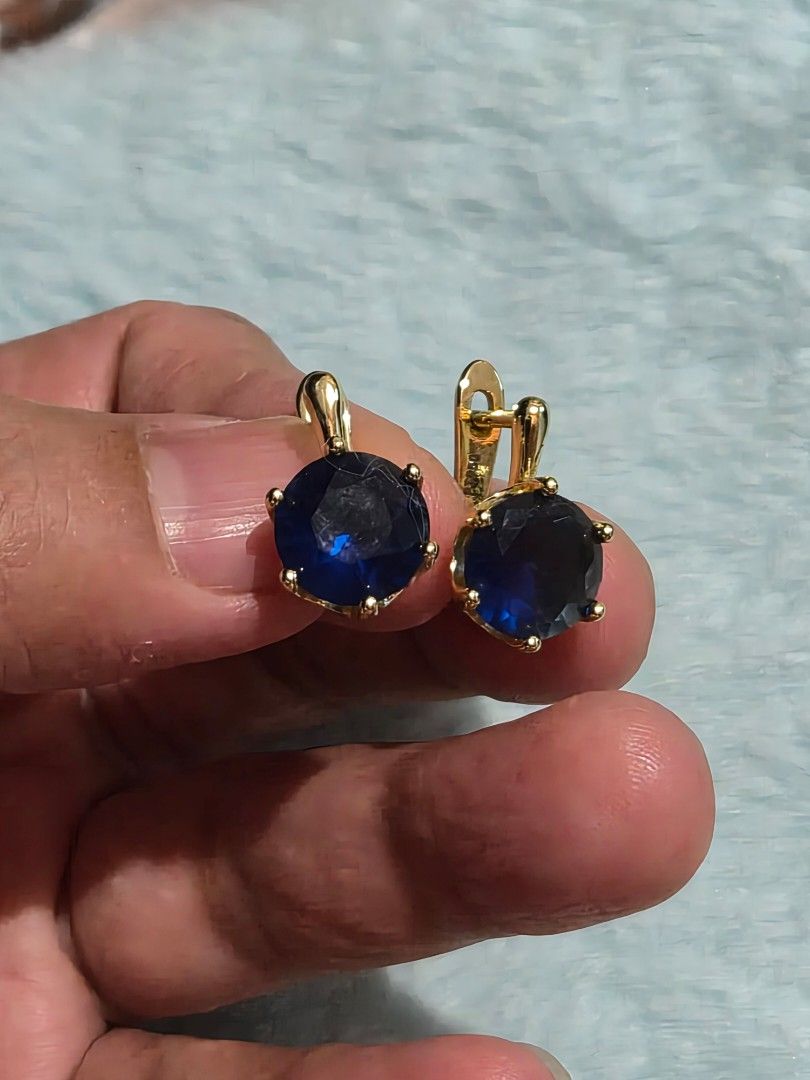 Gold Blue Sapphire Leverback Earrings PT950 (Category: Earrings) located in Mandaue City. Submitted by chuchi152615 (Listing ID 1465288283, Image 1). Description: - Gold-tone finish with deep blue round faceted stones - Secure leverback closure for easy, comfortable daily wear - Marked PT950 on the metal clasp - Clean and polished design - Versatile everyday accessory.
