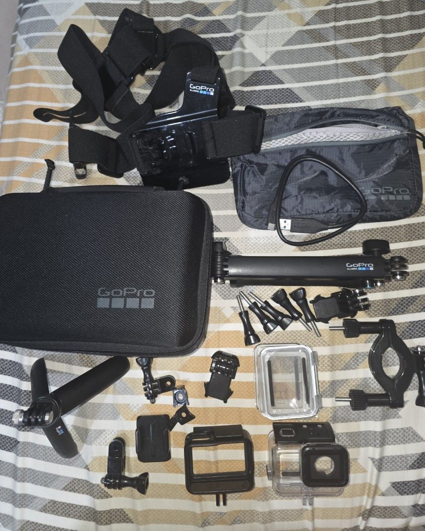 GoPro Hero 7 Black Bundle with Accessories (Category: Cameras) located in Pasig City. Submitted by 1zero23 (Listing ID 1465381785, Image 2). Description: GoPro Hero 7 Condition: - no crack/dent/issues - slight discoloration from being kept while it was in the underwater case, can be seen in the picture (does not affect performance) - all buttons are working - only used 3x Item Package: - Hero 7 black unit - dual charger - total of 3 batteries - f