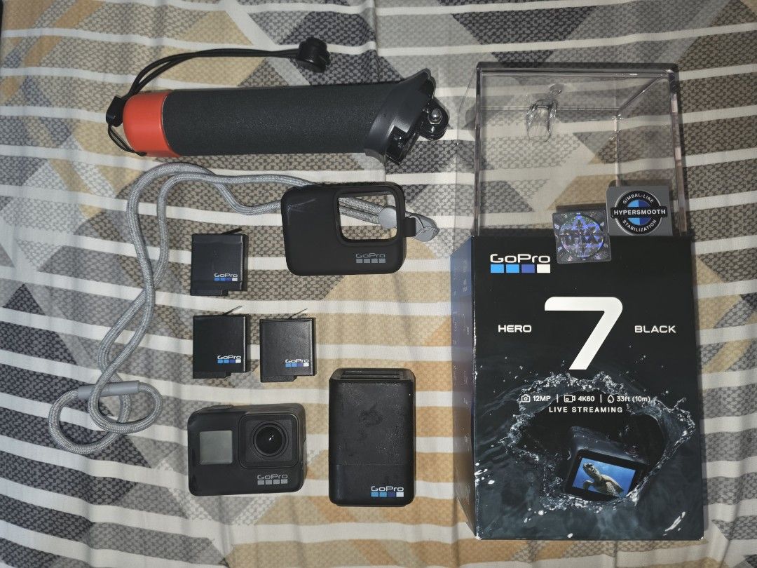 GoPro Hero 7 Black Bundle with Accessories (Category: Cameras) located in Pasig City. Submitted by 1zero23 (Listing ID 1465381785, Image 1). Description: GoPro Hero 7 Condition: - no crack/dent/issues - slight discoloration from being kept while it was in the underwater case, can be seen in the picture (does not affect performance) - all buttons are working - only used 3x Item Package: - Hero 7 black unit - dual charger - total of 3 batteries - f