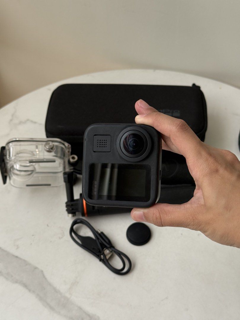 GoPro MAX 360 Action Camera Bundle with Accessories (Category: Video Cameras) located in Manila. Submitted by tjcabral (Listing ID 1465375540, Image 3). Description: 🎀 FOR SALE | GoPro MAX 360 Camera Bundle 📸✨ ₱18,000 | Slightly Negotiable Like new! Barely used (less than 5 times) and still in excellent, almost brand-new condition. Perfect for motorcycle rides, travel, vlogging, and content creation! 🤍 📦 Bundle Includes: ✔️ GoPro MAX 360 Came