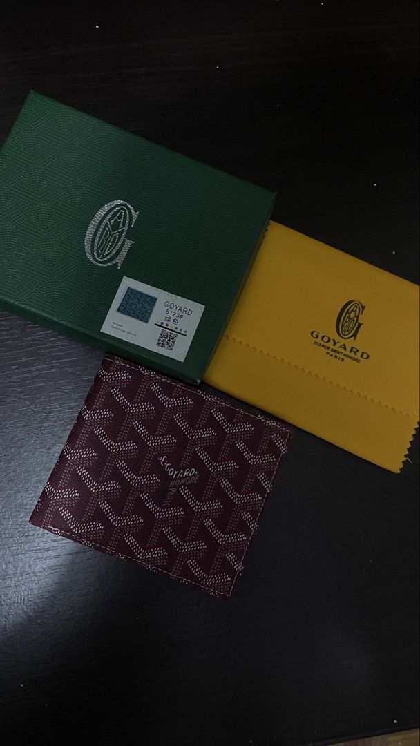 Goyard Bi-Fold Wallet (Category: Luxury Bags & Wallets) located in Manila. Submitted by parengjeyflips (Listing ID 1465266379, Image 2). Description: - Authentic Goyard bi-fold wallet - Features the iconic Goyardine pattern - Includes original box and dust cloth - Available colors: Black, Red, Green - Multiple card slots for organization - Bill compartment for cash - A stylish and functional accessory.