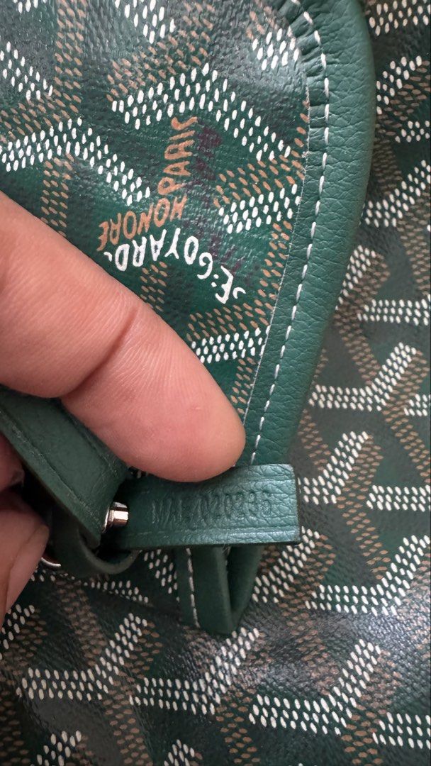 Goyard Green Hobo Shoulder Bag (Category: Luxury Bags & Wallets) located in Cauayan City . Submitted by espiritucj (Listing ID 1465214740, Image 2). Description: Thrifted- - Goyard green hobo bag in iconic chevron coated canvas - Solid green leather trim with stylish contrast white stitching - Comfortable single shoulder strap for everyday wear - Light-colored fabric interior featuring a secure zippered pocket - Stamped Goyard Paris Made in Franc