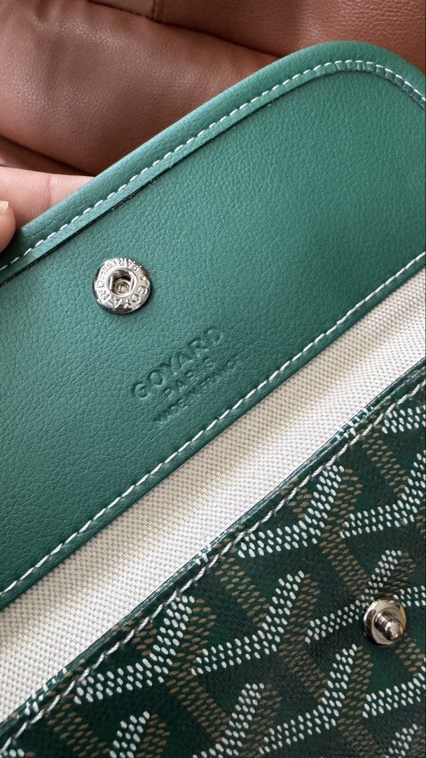 Goyard Green Hobo Shoulder Bag (Category: Luxury Bags & Wallets) located in Cauayan City . Submitted by espiritucj (Listing ID 1465214740, Image 3). Description: Thrifted- - Goyard green hobo bag in iconic chevron coated canvas - Solid green leather trim with stylish contrast white stitching - Comfortable single shoulder strap for everyday wear - Light-colored fabric interior featuring a secure zippered pocket - Stamped Goyard Paris Made in Franc