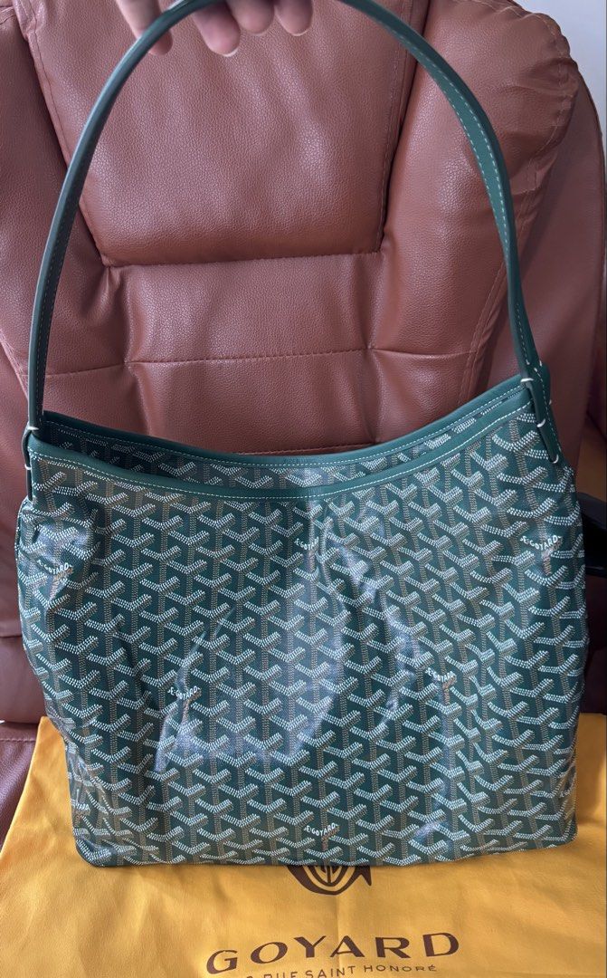 Goyard Green Hobo Shoulder Bag (Category: Luxury Bags & Wallets) located in Cauayan City . Submitted by espiritucj (Listing ID 1465214740, Image 1). Description: Thrifted- - Goyard green hobo bag in iconic chevron coated canvas - Solid green leather trim with stylish contrast white stitching - Comfortable single shoulder strap for everyday wear - Light-colored fabric interior featuring a secure zippered pocket - Stamped Goyard Paris Made in Franc