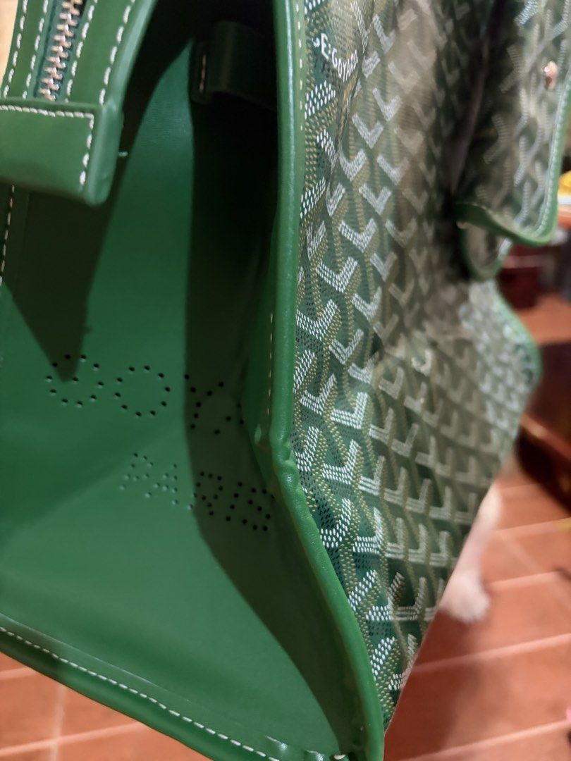 Goyard Green Tote Bag with Pouch (Category: Luxury Bags & Wallets) located in Manila. Submitted by lynnalec25 (Listing ID 1465363097, Image 3). Description: - Color: Vibrant green with iconic Goyard chevron pattern - Material & Trim: Premium build with solid green leather trim and dual top handles - Includes: Matching detachable pouch that snaps onto the front exterior - Closure: Secure zip top closure along the top panel - Details: Perforated Go