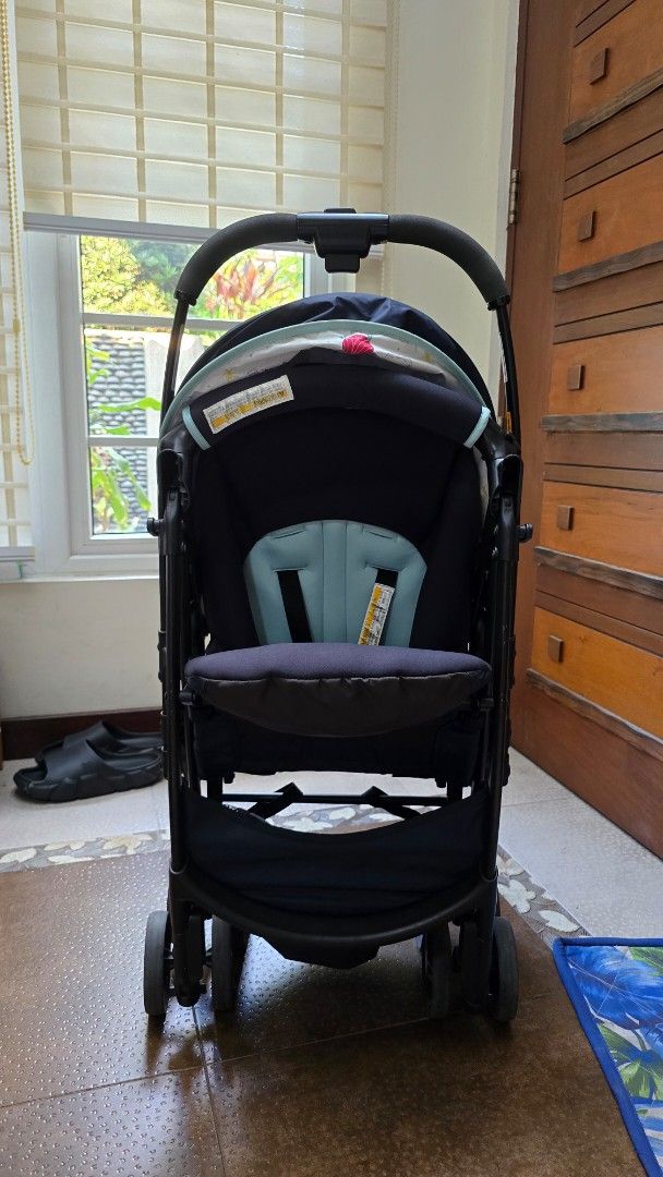 Graco Baby Stroller Dark Blue Light Blue (Category: Strollers) located in Caloocan City. Submitted by FlexiMart (Listing ID 1465219928, Image 1). Description: - Authentic Graco stroller in stylish dark and light blue - Adjustable canopy to protect your baby from the sun - Comfortable padded seat equipped with secure safety harness straps - Spacious under-seat storage basket for diaper bags and groceries - Smooth-rolling wheels ideal for neighborh
