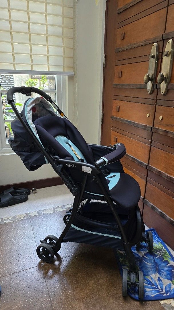 Graco Baby Stroller Dark Blue Light Blue (Category: Strollers) located in Caloocan City. Submitted by FlexiMart (Listing ID 1465219928, Image 2). Description: - Authentic Graco stroller in stylish dark and light blue - Adjustable canopy to protect your baby from the sun - Comfortable padded seat equipped with secure safety harness straps - Spacious under-seat storage basket for diaper bags and groceries - Smooth-rolling wheels ideal for neighborh
