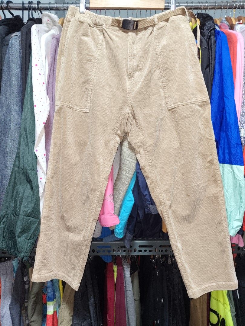 Gramicci Corduroy Pants Tan Size L (Category: Trousers) located in San Juan City. Submitted by swiftfox.62e2f4 (Listing ID 1465338849, Image 1). Description: - Brand: Gramicci - Item: Corduroy Pants - Color: Versatile Tan - Size: L - Fit: Comfortable wide-leg cut - Features: Elasticated waistband with integrated webbing belt and iconic running man buckle - Storage: Generous front patch pockets - Material: Classic textured corduroy.